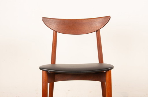 Pair of Danish teak and skai chairs, new, by Harry Ostergaard for Randers Møbelfabrik, 1960.