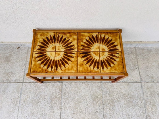Image 1 of Vintage teak and ceramic coffee table with sun motif, 1960