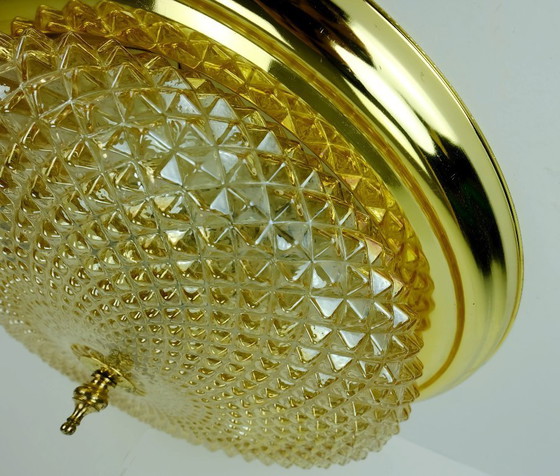Image 1 of mid century ceiling LAMP flush mount textured amber glass and brass 1970s
