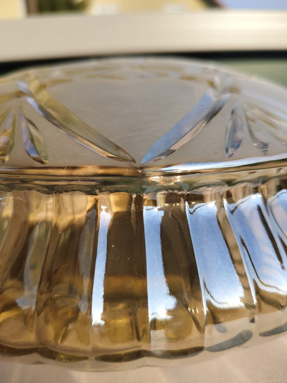 Image 1 of Een paar hoogwaardige vintage wand-/plafondlampen van loodkristal met stervormige slijping.