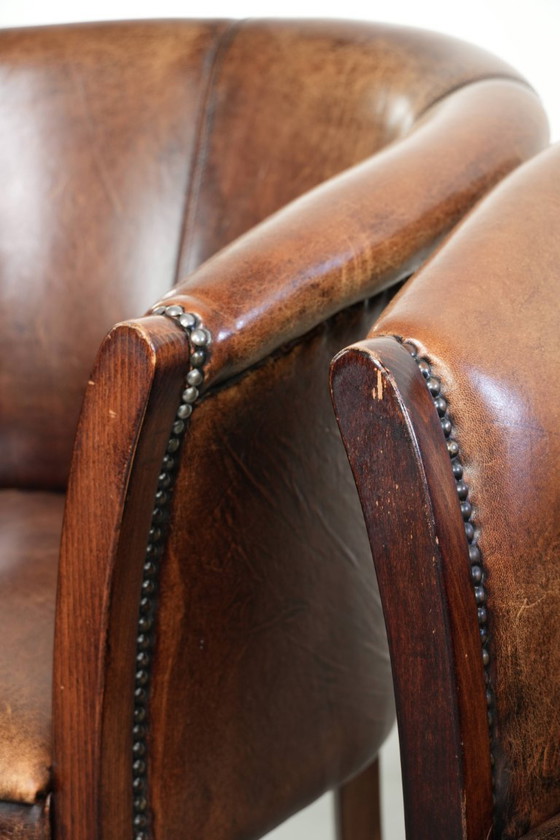 Image 1 of 2x handige schapenleren bijzetstoel/ fauteuil/tubchair met karakter en een mooi patina