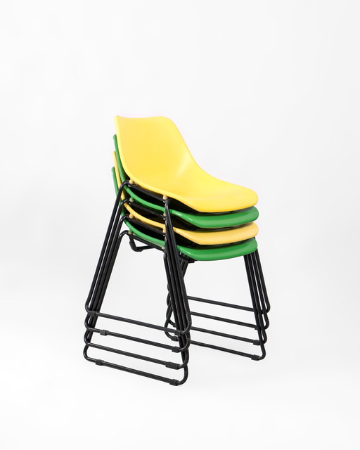 4 X Green And Yellow Stackable Chairs Made Of Iron