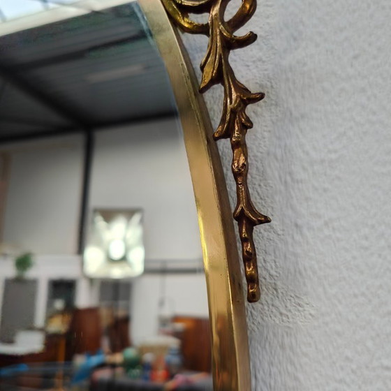 Image 1 of Vintage Goudkleurige Ovale spiegel kuifspiegel schouwspiegel. Koper 