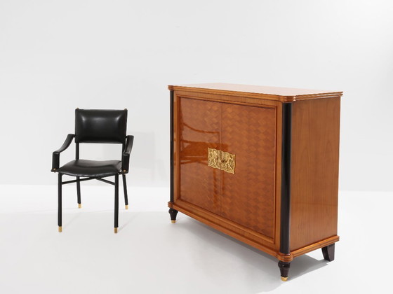 Image 1 of Meuble à deux portes Jules Leleu en bois de cerisier marqueté de bronze, 1940