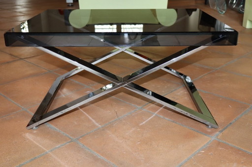 Aster X salontafel van gepolijst verchroomd aluminium en rookglas.