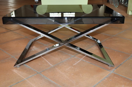 Image 1 of Aster X salontafel van gepolijst verchroomd aluminium en rookglas.
