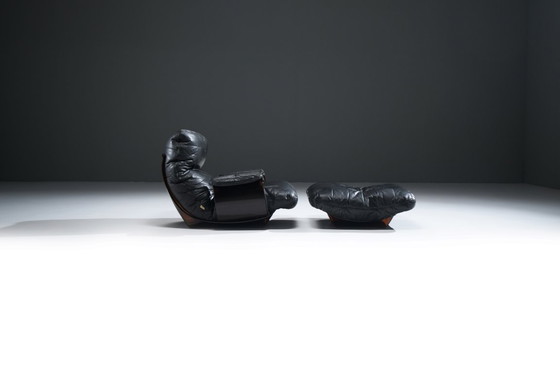 Image 1 of Rara poltrona e pouf Marsala in pelle nera - Michel Ducaroy - Ligne Roset