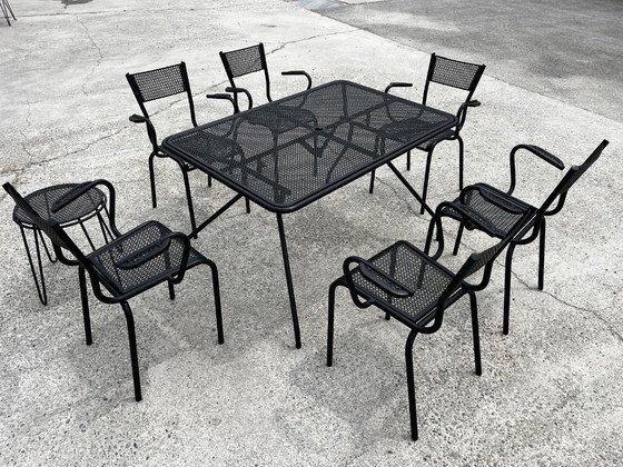 Image 1 of Set of 6 armchairs and table, in perforated metal in the style of Mathieu Matégot 1950