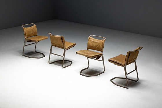 Image 1 of Eetkamerstoel van leer en staal, ontworpen door Raymond Rombouts, België, 20e eeuw.