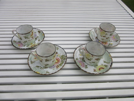Image 1 of Vintage 4 Asian miniature cups and saucers with gold tone rims new condition