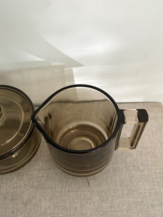 Image 1 of Jarra de leche y azucarero antiguos de Joe Colombo “Arno Italora”, de cristal ahumado.