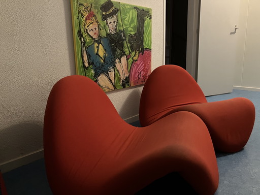 2 rode tongstoelen Pierre Paulin