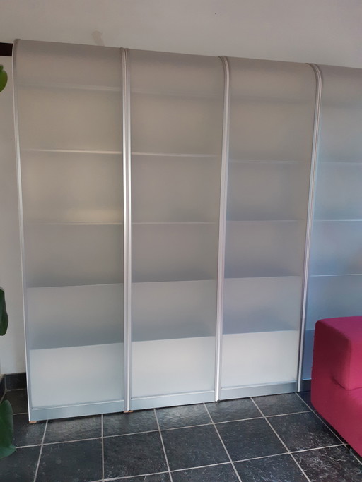 4 Bücherregale Pastoe, mit Rollladen.