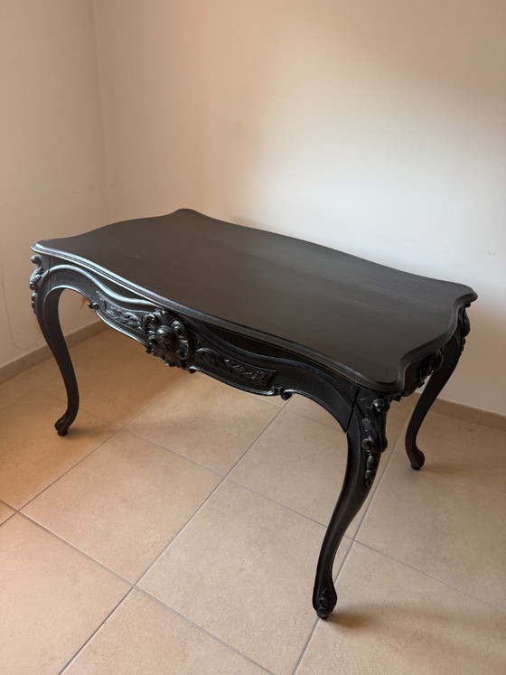 Image 1 of Mesa de comedor/escritorio de estilo barroco en madera de haya negra.