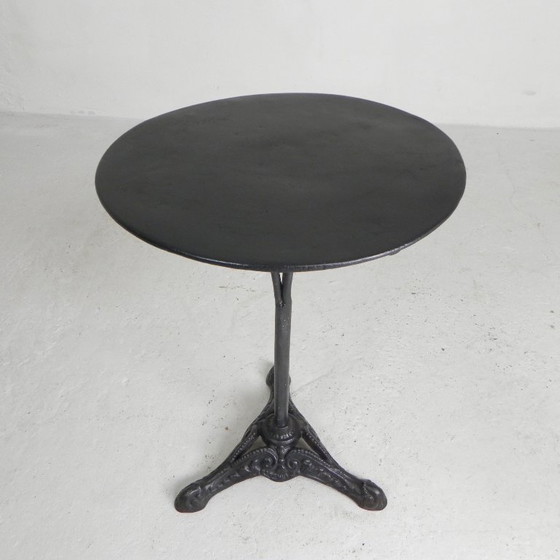 Image 1 of Bistro table with cast iron legs and round steel top, 1930s