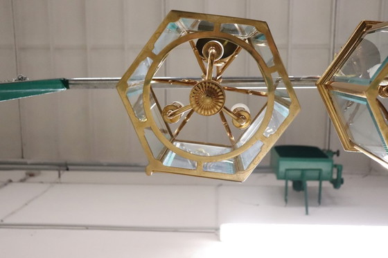 Image 1 of Een paar vintage lantaarns van verguld metaal en glas.