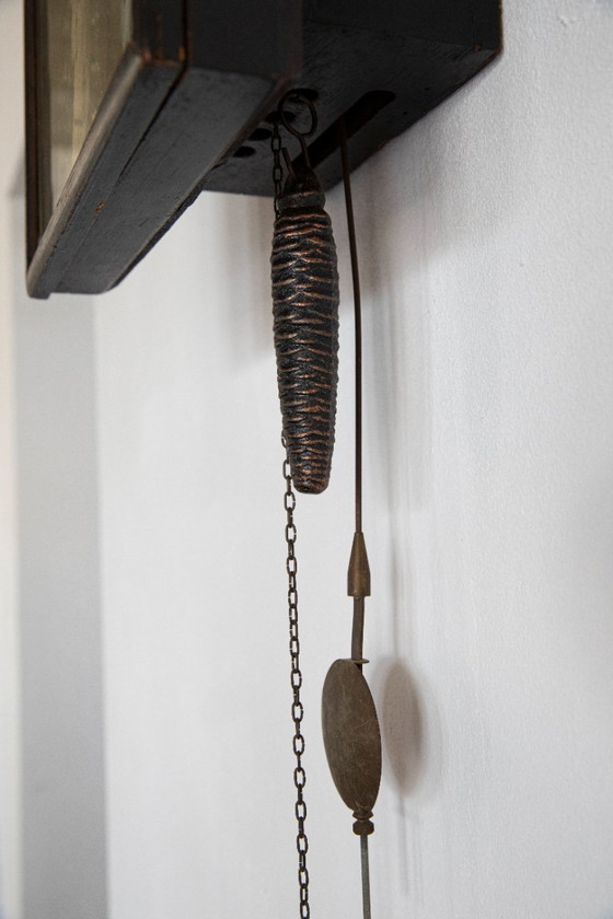 Image 1 of Antieke wandklok met gewicht en slinger
