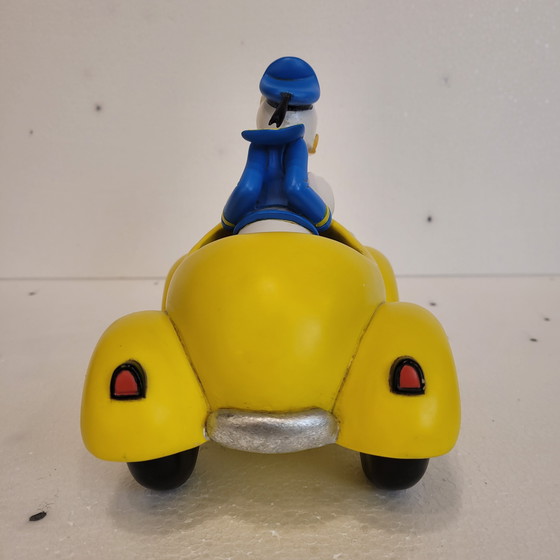 Image 1 of Pato Donald con Coche Amarillo, Rutten, Resina, 2000’s - Estados Unidos