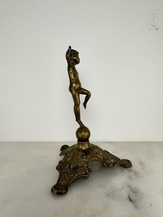 Image 1 of Antique bronze figurine of playing child - decorative and rare