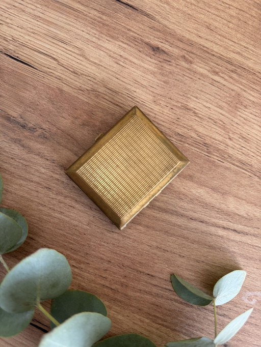 vintage mother-of-pearl powder compact