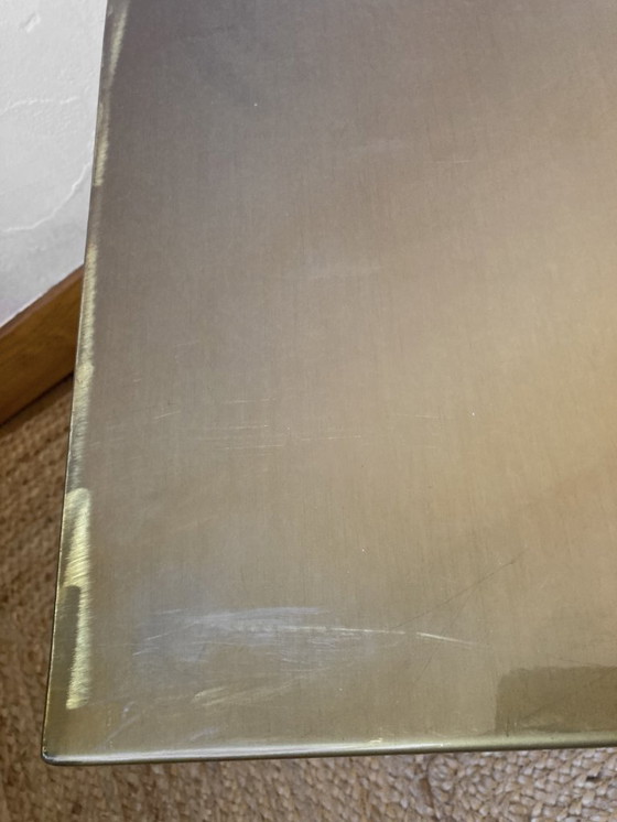 Image 1 of Electro-galvanized metal seat, brass effect. Pharrell Williams / Louis Vuitton fashion show, 2024