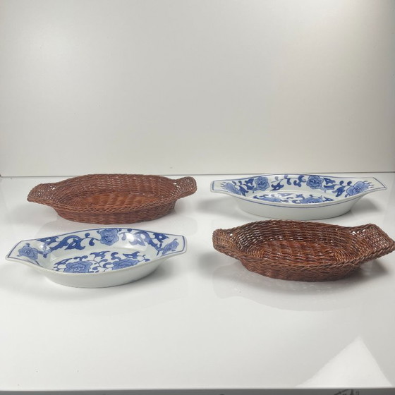 Image 1 of Set of 6 ceramic serving platters in white and blue floral pattern with woven wicker mount, 1970/80