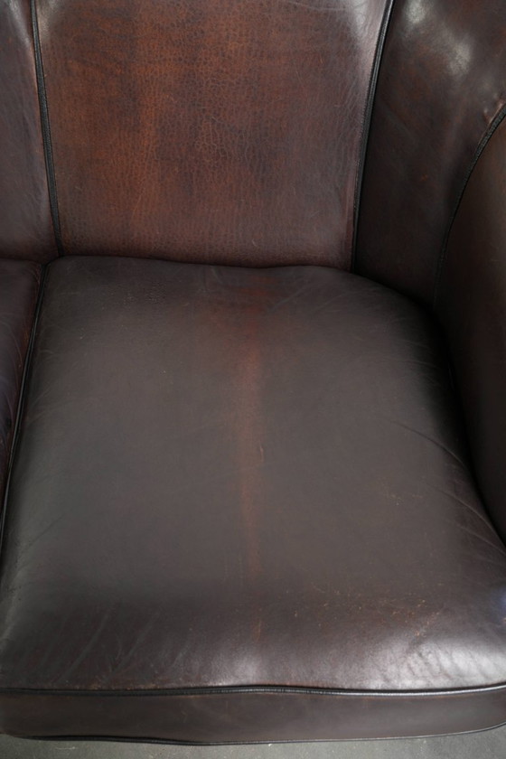 Prachtige set van een schapenleren bankstel samen met zijn bijpassende clubfauteuil met een luxe voorkomen (photo 17 of 22)