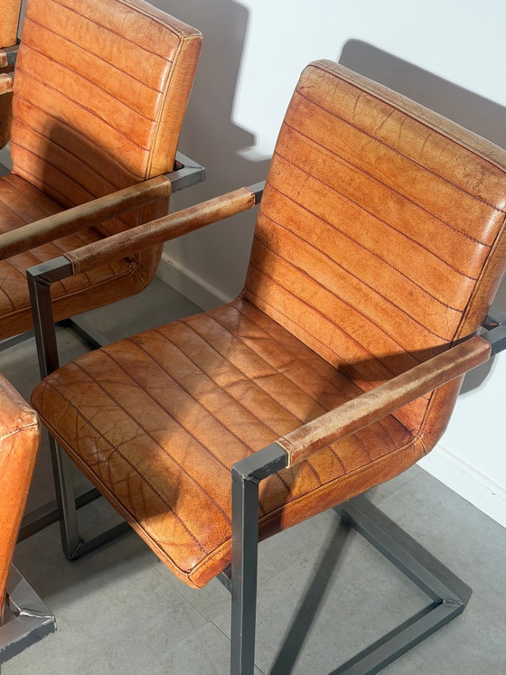 Ensemble de 6 fauteuils cantilever vintage en cuir cognac (photo 4 of 6)