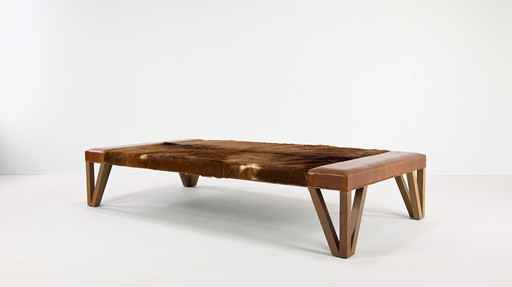 Lionel Jadot, Important Daybed in Cowhide, Leather and Oak. C.2010