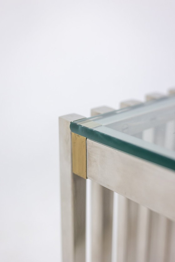 Image 1 of Coppia di tavolini o comodini in metallo cromato. Anni '70.