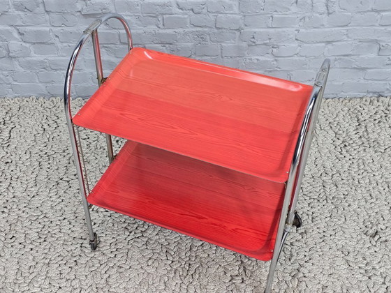 Image 1 of Vintage Foldable and Mobile Chrome Steel ‘Dinett’ Serving Trolley with 2 Red Layers by Gerlinol, Germany, 1970s. 