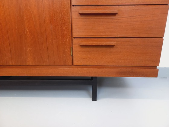 Image 1 of Tall, modernist, vintage Scandinavian sideboard in teak and black metal from the 1960s