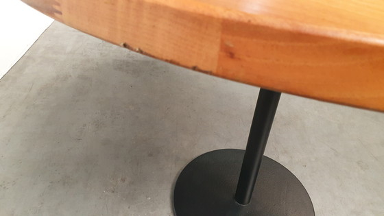 Image 1 of Round mixed wood table 100cm cast iron base Pedrali