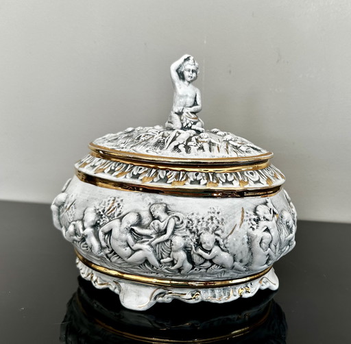 Capodimonte cupid's lidded jar