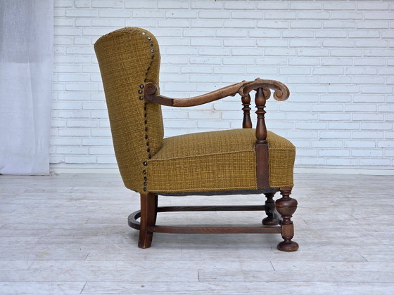 Image 1 of Deense fauteuil uit de jaren 60, originele groene meubelwol, gesneden eikenhout