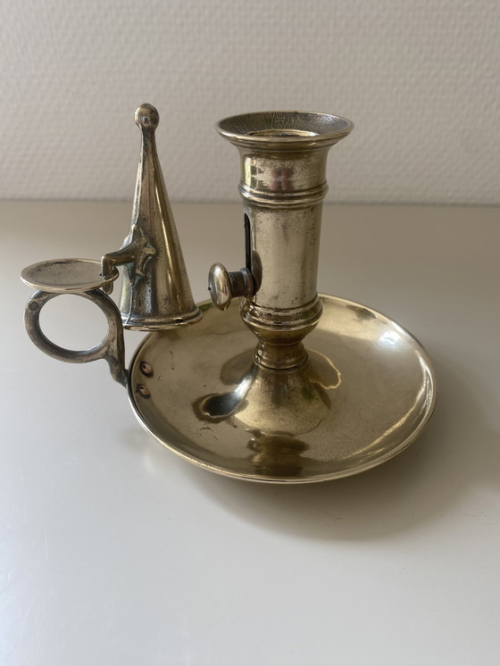 Image 1 of Antique candlestick in solid bronze