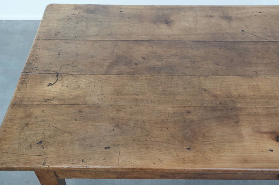 Image 1 of Early 19th century French fruitwood dining table with two drawers