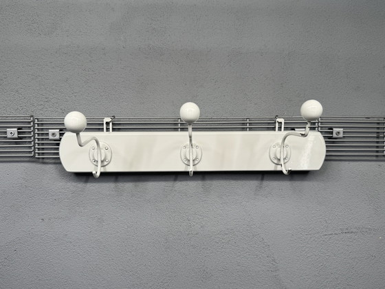 Image 1 of Mid - Century coat rack sleek and timeless design
