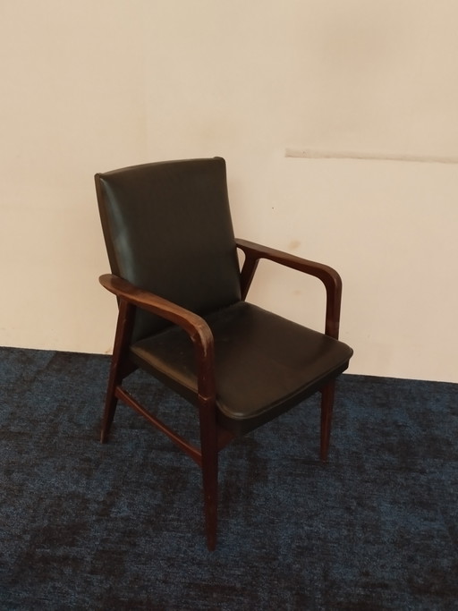 Vintage Scandinavische stoel van teakhout en leer uit de jaren 60.