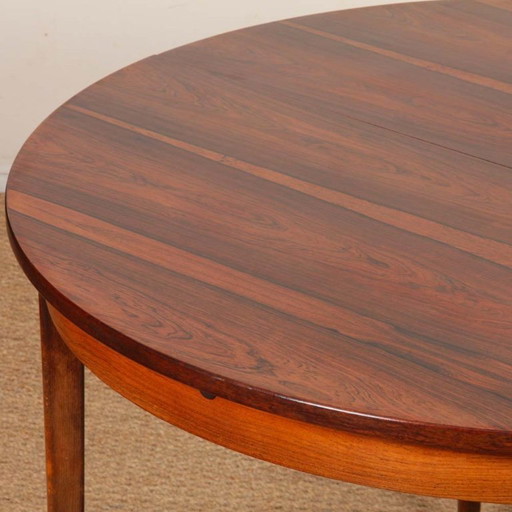 Round extendable dining table in Rio rosewood, 1960