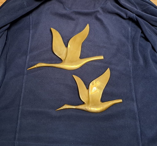Two flying swans brass wall decoration