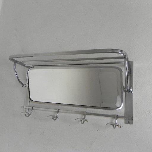 Perchero de pared Art Déco con espejo biselado ajustable en marco cromado, década de 1930.