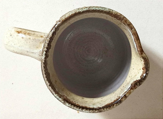 Image 1 of Stoneware pitcher stamped Giraud. Height 18.5 cm