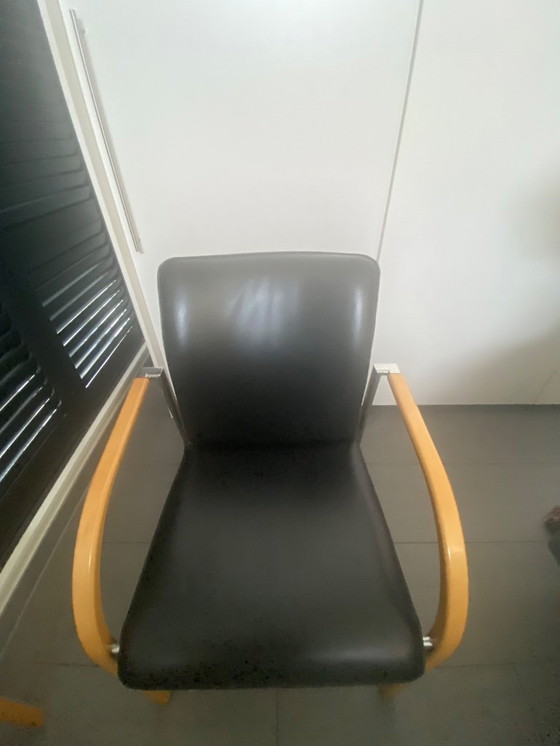 Image 1 of Leolux dining room chairs 4 pieces