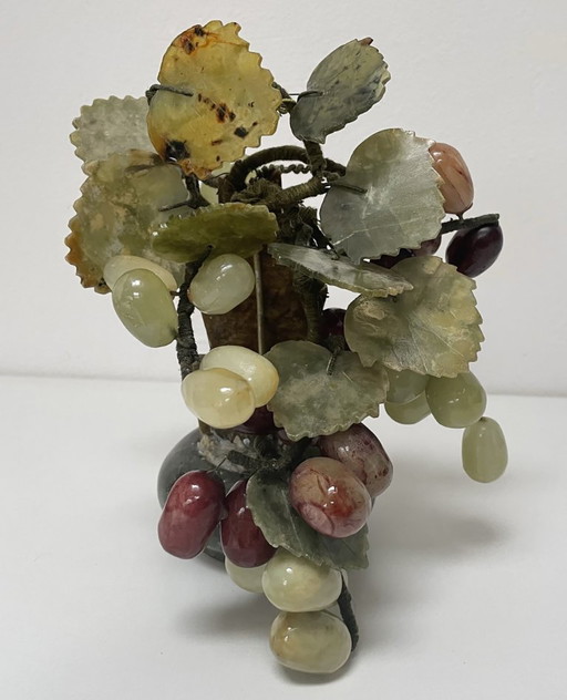 Vine with leaves and grapes in carved stone and jade, China, mid-20th century