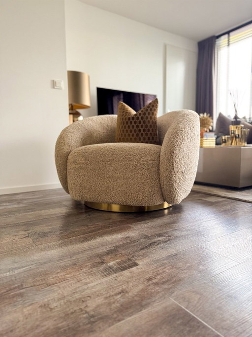 Fauteuil pivotant Eichholtz Diego Canberra Sand