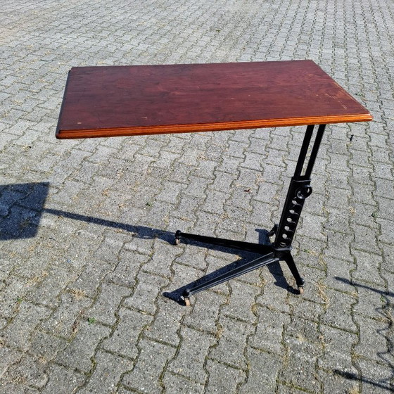 Image 1 of Tavolo industriale antico - Legno e metallo - Altezza regolabile