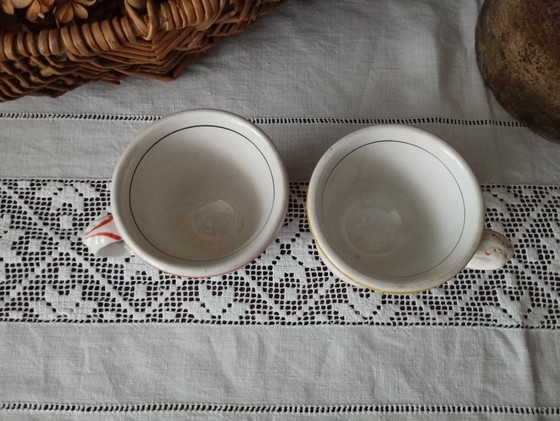 Image 1 of Een paar Sarreguemines ondoorzichtige porseleinen vuurkorfjes (1857-1900)