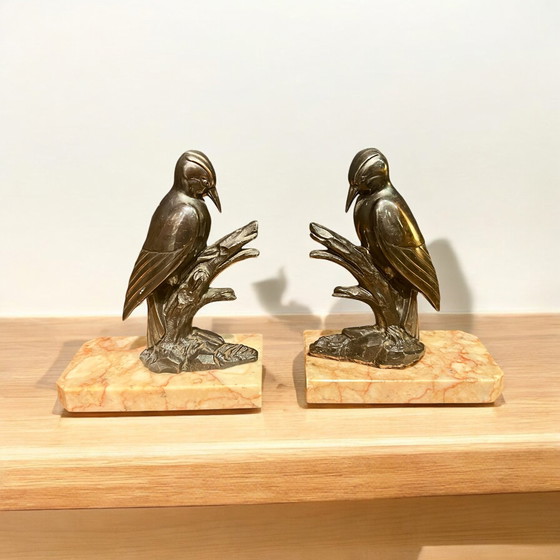 Image 1 of Vintage bookends Two woodpeckers on branch made of patinated pewter on marble top in Art Deco style