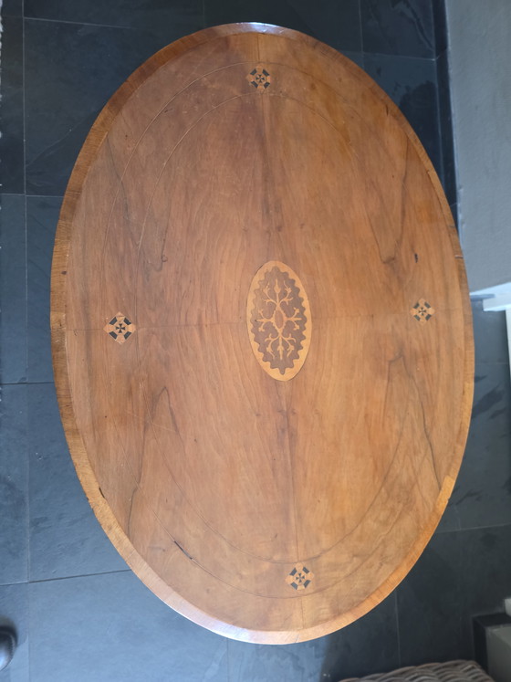 Image 1 of Oval table